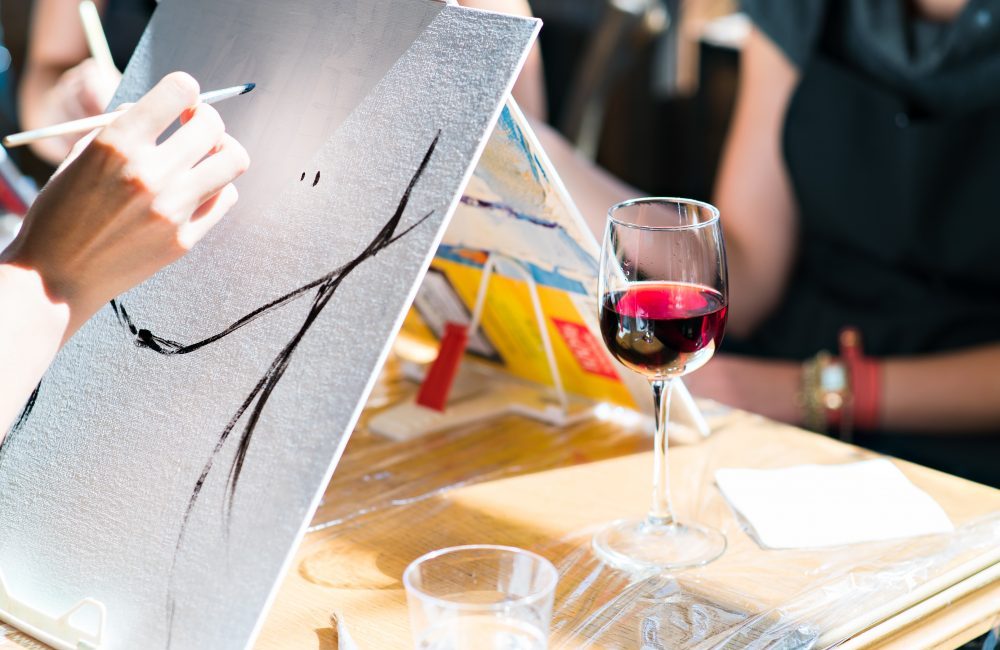 Drawing a glass of red wine on a table