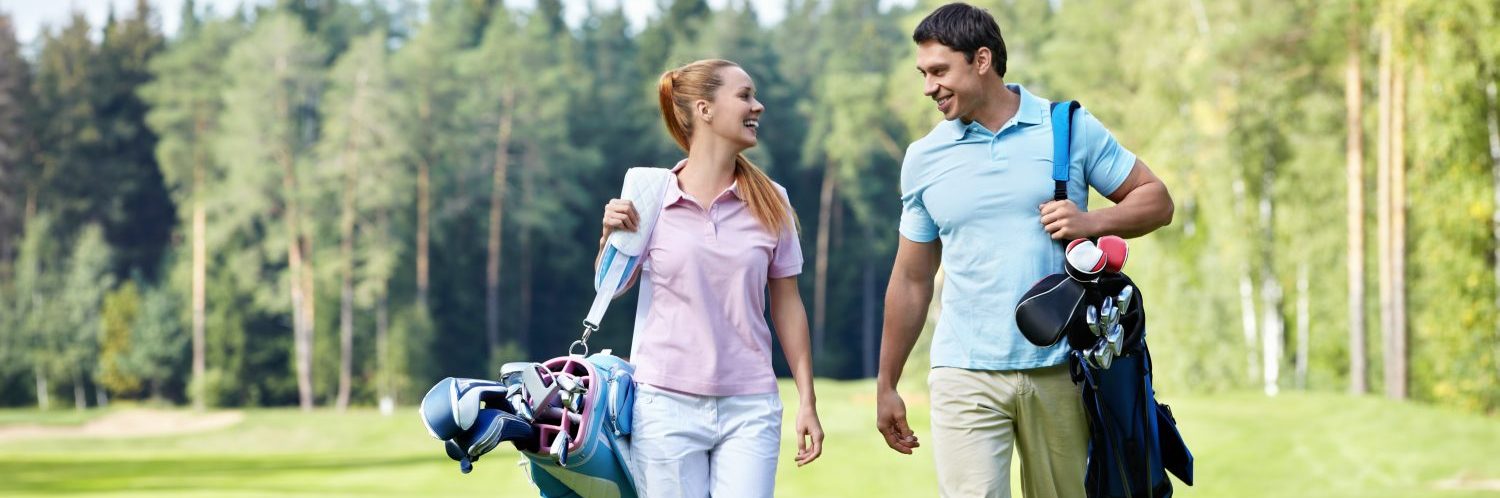 Young couple on the golf course