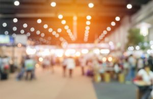 A crowd blurred in lights